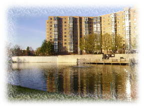 condominium with reflecting pond