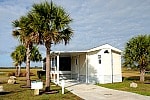 Floridabeigemobilehome with palms 150min