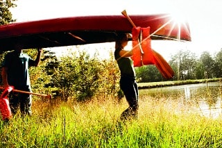 Crosswind Charleston community - boating on pond