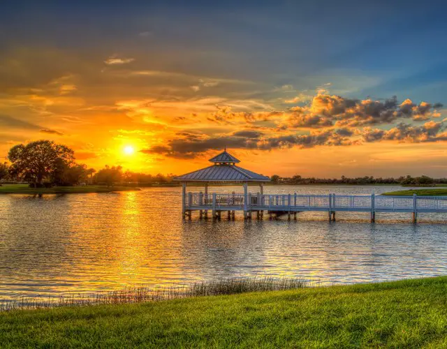 Florida sunset over water at retirement community.