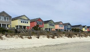 Row of houses alongside ocean at Surfside Beach