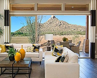 Four Seasons at Scottsdale Heights model home living room with view of Pinnacle Peak