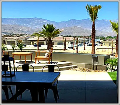 Rancho Mirage by Del Webb patio view with tiny waterfall feature
